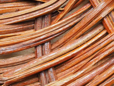 Abstract image, background, texture, closeup. wicker basket. curved orange an Stock Photos