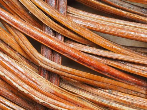 Abstract image, background, texture, closeup. wicker basket. curved orange an Stock Photos