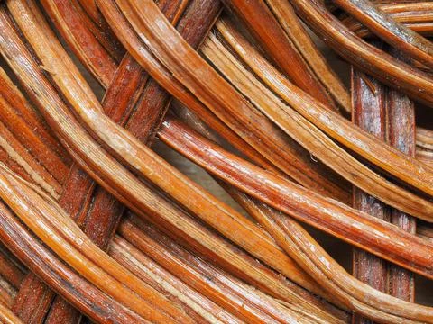 Abstract image, background, texture, closeup. wicker basket. curved orange an Stock-Fotos