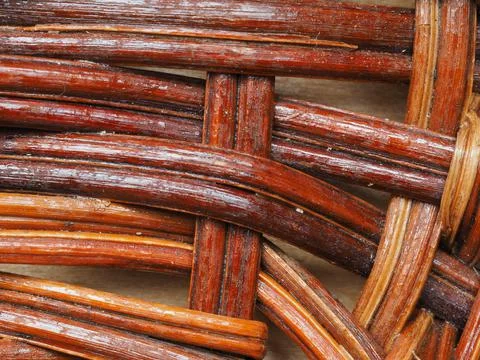 Abstract image, background, texture, closeup. wicker basket. curved orange an Stock Photos