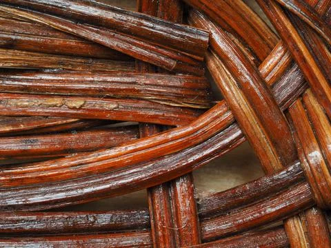 Abstract image, background, texture, closeup. wicker basket. curved orange an Stock Photos