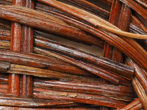 Abstract image, background, texture, closeup. wicker basket. curved orange an Stock Photos