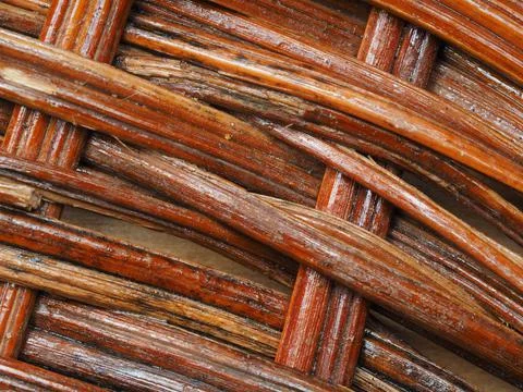 Abstract image, background, texture, closeup. wicker basket. curved orange an Stock Photos