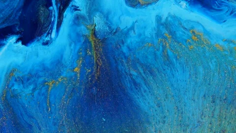 An abstract image of blue ocean marble with gold flecks, a fluid artistic backgr Video stock 341671442