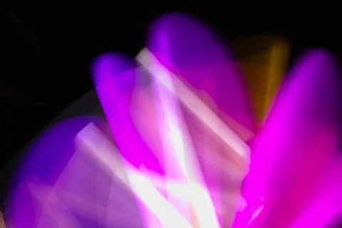 Abstract image of blurry motion, purple light painting effect, creating a c.. Stock Illustration