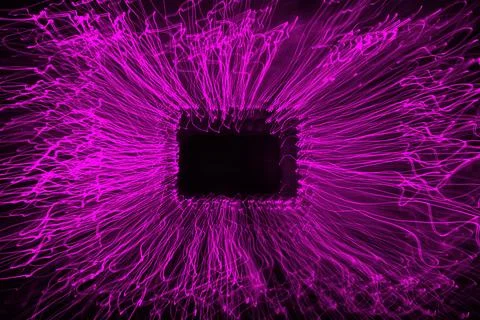 An abstract image of bright neon magenta lines forming a rectangle Stock Photos