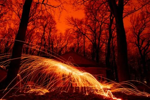 Abstract Image of Burning Wirewool being used to make circle like light trail Stock Photos