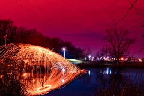 Abstract Image of Burning Wirewool being used to make circle like light trail Stock Photos