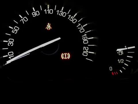 Abstract image of car dashboard with speedometer and fuel tank indicator in b Stock Photos