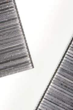 Abstract image composed of two office staples slats Stock Photos