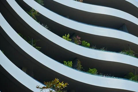 Abstract image of the facade of a modern building in europe with plants 스톡 사진