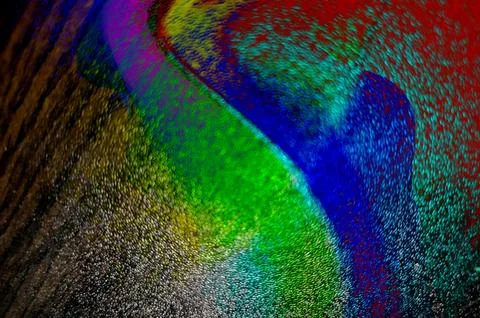 Abstract image featuring a swirling pattern of vibrant colors including red.. Stock Illustration