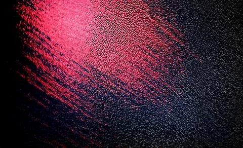 Abstract image featuring a textured surface with a gradient of red to black.. Stock Illustration