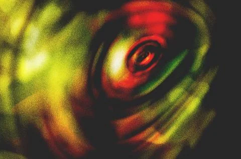 Abstract image featuring vibrant circular patterns blending green, red, and.. イラスト素材