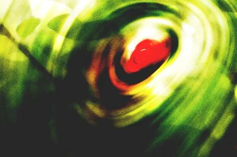Abstract image featuring vibrant circular patterns blending green, red, and.. イラスト素材