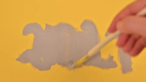 Abstract image with gray paints on a yellow background. Panton 2021 trend Stock Footage 145226631