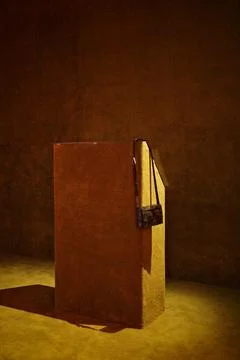 Abstract image of a leather bag hanging on a display stand 스톡 사진