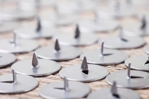 Abstract image of metal sharp pushpin, selective focus Stock Photos