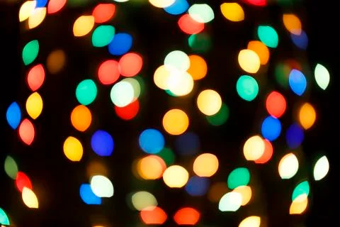 Abstract image. Multi-colored bokeh on a black background Stock Photos
