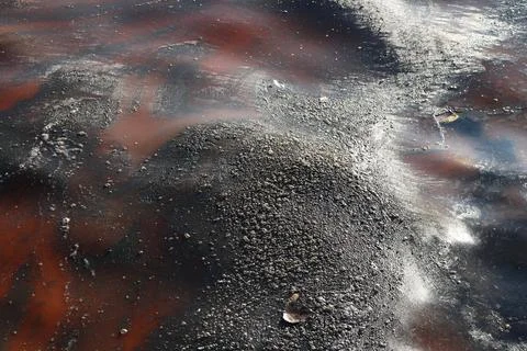 Abstract Image of Polluted Water Surface with Oily Patterns Stock Photos