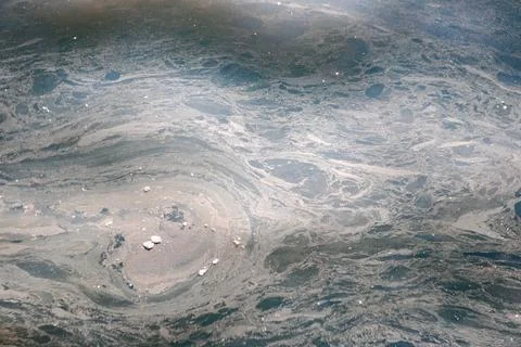 Abstract Image of Polluted Water Surface with Oily Patterns Stock Photos