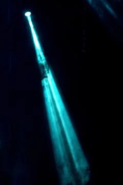 Abstract image with rays of colored light in the dark Stock Photos