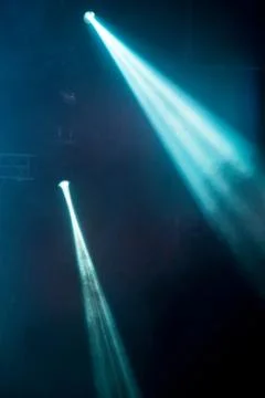 Abstract image with rays of colored light in the dark Stock Photos