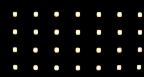 Abstract image of square light dots on dark black background Stock Photos