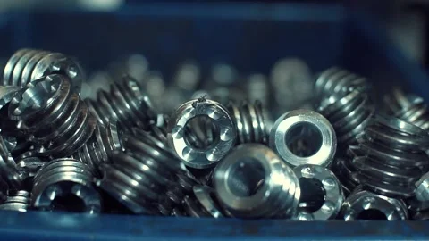Abstract industrail background, Top view metal bolt. bolt production Stock Footage 137656793