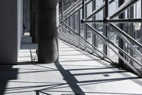 Abstract interior background with concrete pillar and steel framework Stock Photos