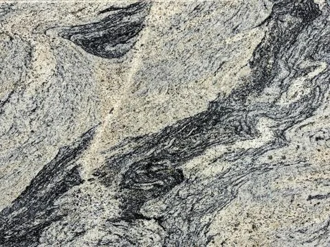 Abstract Intricate Patterns by Black and Grey Flowing Vein on Granite Slab 写真素材