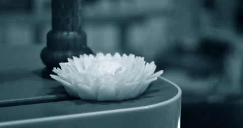 Abstract isolated object flower of yellow color printed on 3d printer Stock Footage 152497521