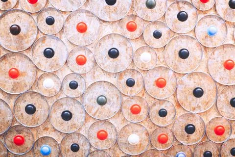 Abstract kitchen background from many round elements of glass lids for frying Foto stock