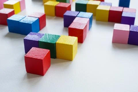 Abstract labyrinth of colored cubes as a symbol of complex system and diversity. 库存照片