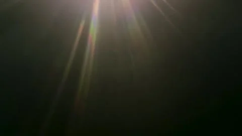 Abstract lens flare light effect on dark background Stock Footage 344985798