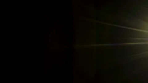 Abstract lens flare light effect on dark background Stock Footage 344985827