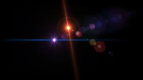 Abstract lens flare light effect with glowing orange and blue rays on black Stock Footage 346199320