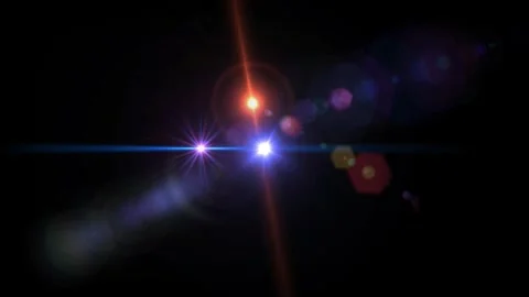Abstract lens flare light effect with glowing blue and orange spots on black Stock Footage 346199487