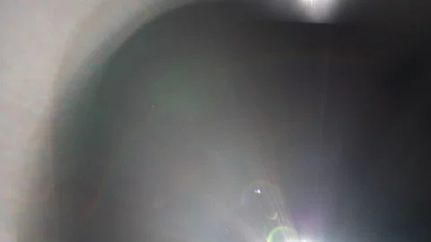 Abstract Lens Flares With Floating Particles On Black Background. Light Leak Stock Footage 166815366