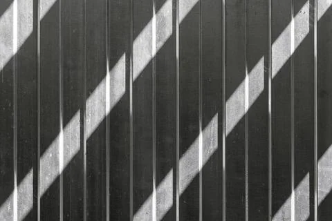 Abstract Light and Shadow Pattern on a Metallic Surface in Black and White Stock Photos