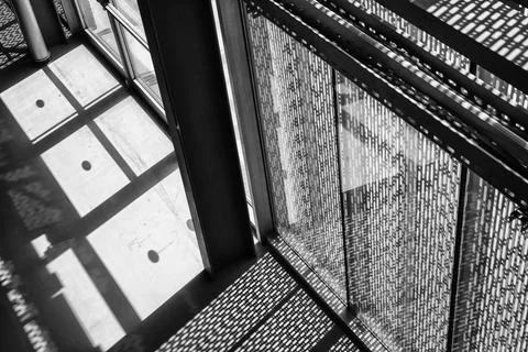 Abstract Light and Shadow Patterns in Modern Industrial Interior Stock Photos