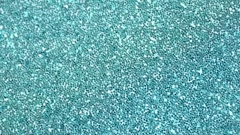 Abstract light blue background, motion glittering blue lights, bokeh effect. Stock Footage 250528440