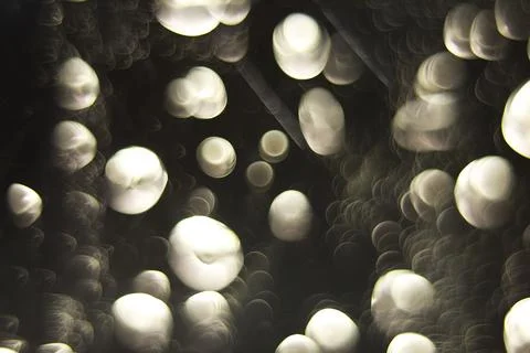Abstract Light Bokeh Background - Blurred Circle Shapes and Soft Glow Pattern Stock Photos