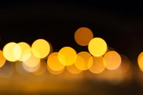 Abstract Light Bokeh Background. Defocused night traffic lights Stock Photos