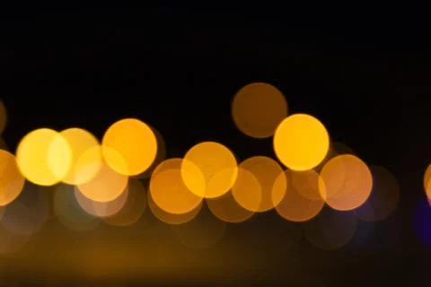 Abstract Light Bokeh Background. Defocused night traffic lights Stock Photos