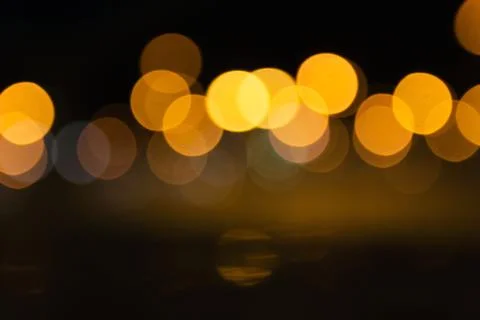 Abstract Light Bokeh Background. Defocused night traffic lights Stock-Fotos