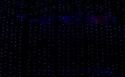 Abstract Light Bokeh Background. Defocused light dots abstract background. Stock Photos