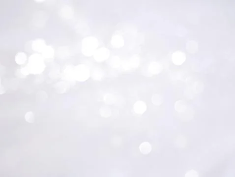 Abstract light bokeh like falling snow. Winter background. Illustrazione stock