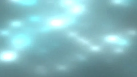 Abstract Light Bokeh Shimmering Blue Tones in Soft Motion Stock Footage 327603852