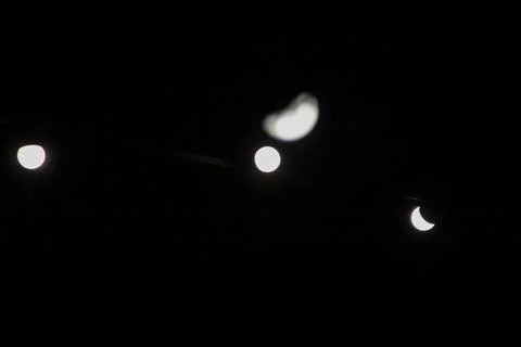 Abstract light bulb on and in the back defocus moon Stock Photos